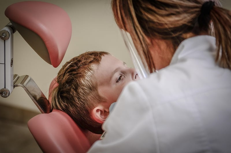Dentist examining a patient